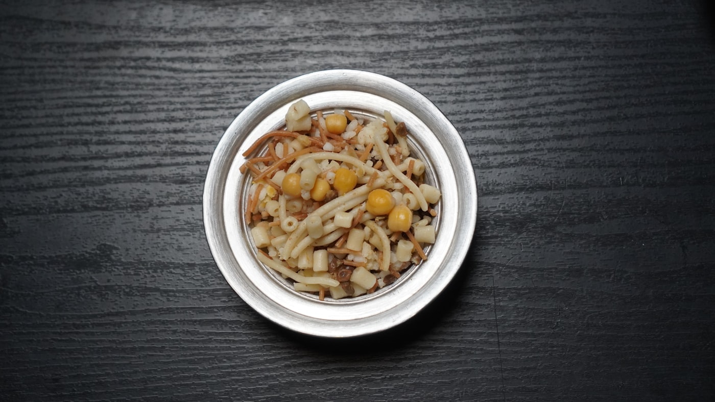 Egyptian koshary, an Arabic-menu favourite, plated for delivery